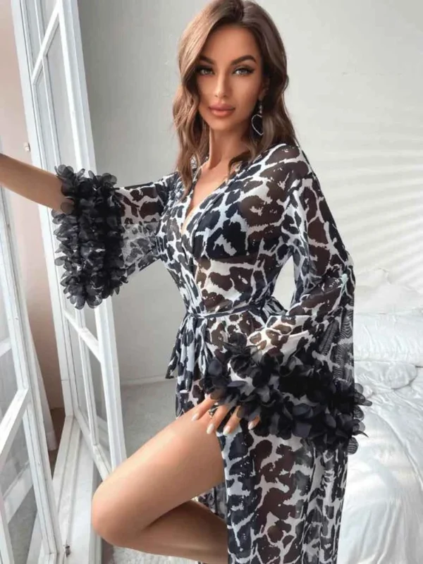 cheetah print stylish net gown with feather lace on sleeves